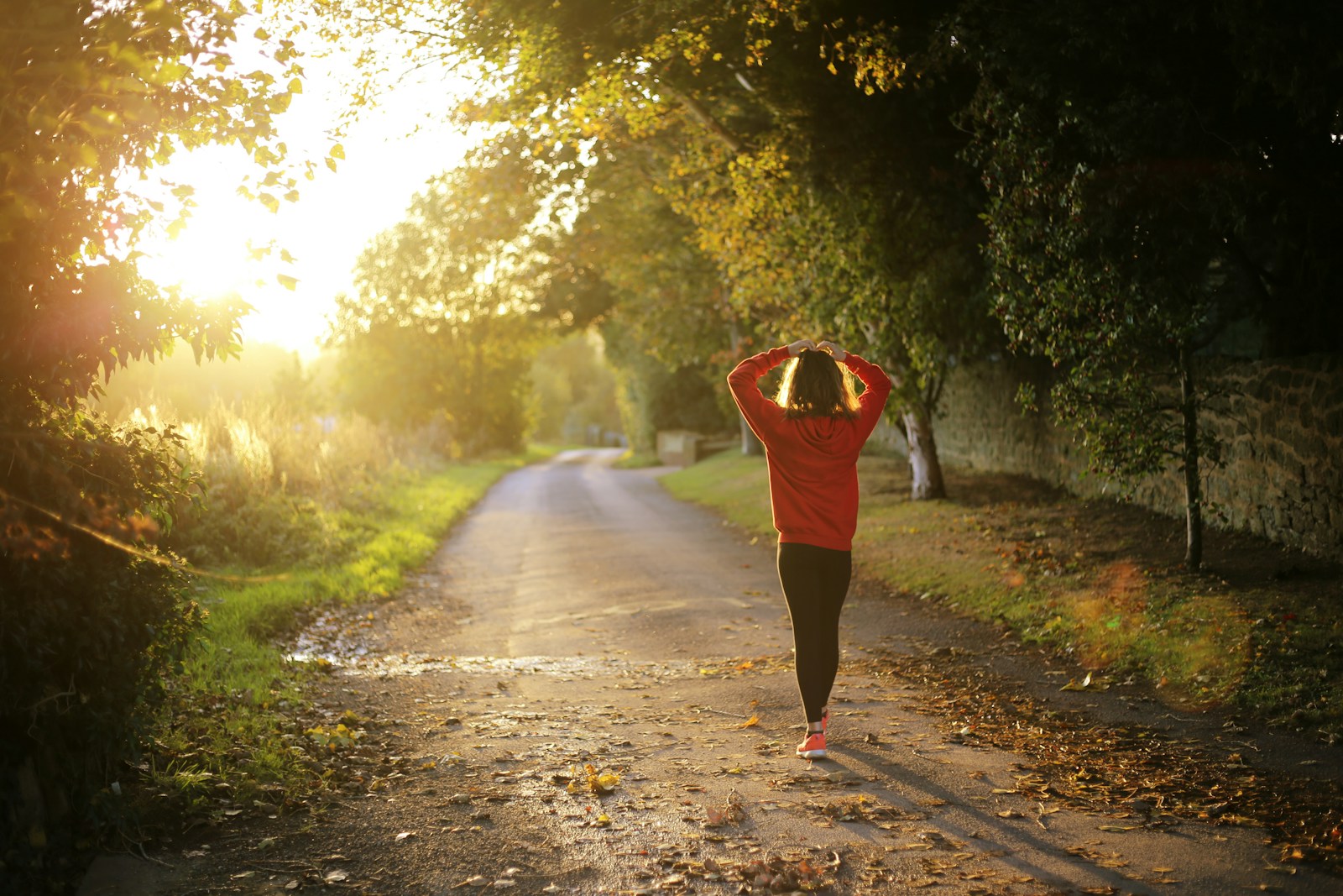Angebote woman walking on pathway during daytime